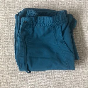 Purple Label Scrubs in a small